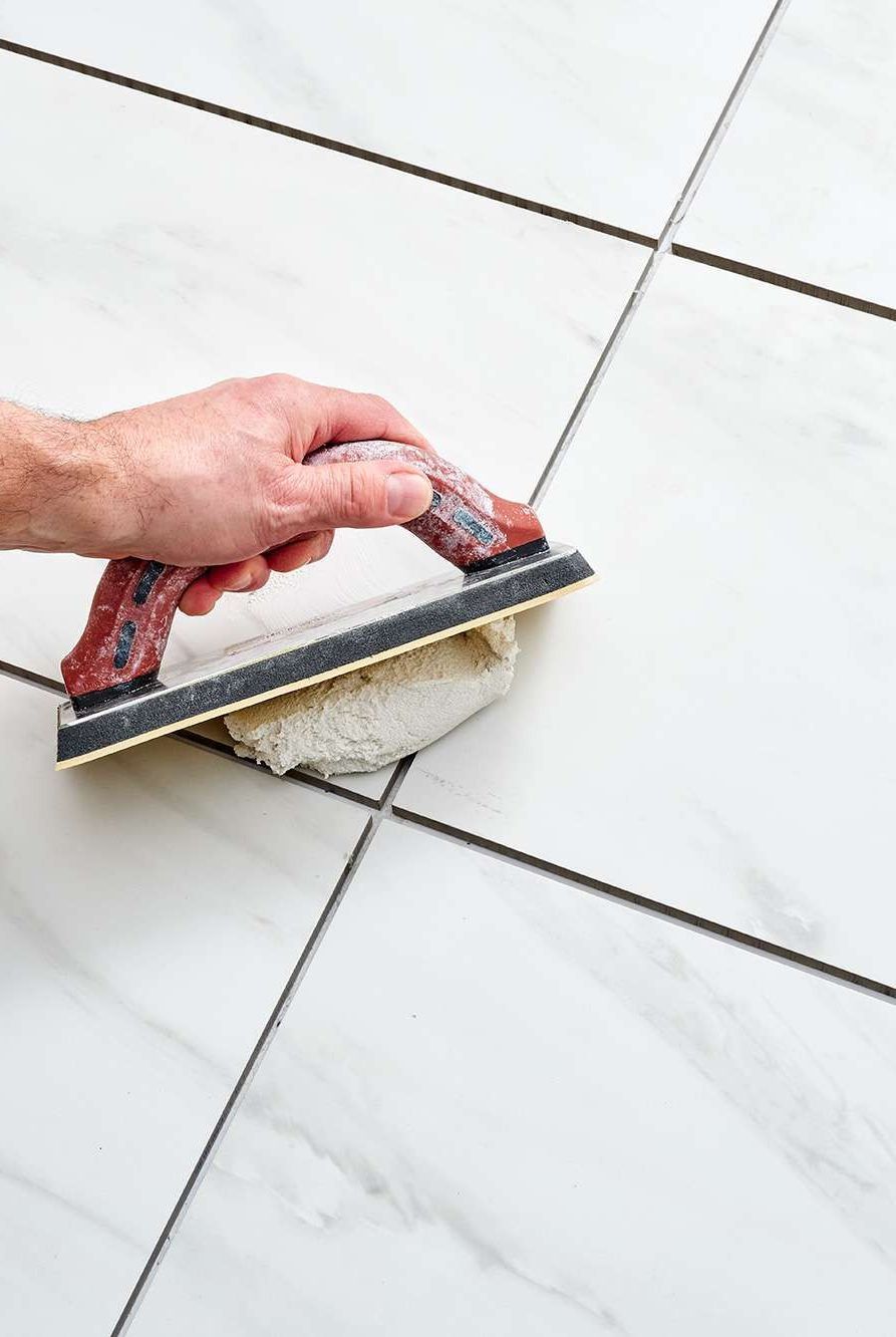 Epoxy grout application for tile joints in a high-performance installation.